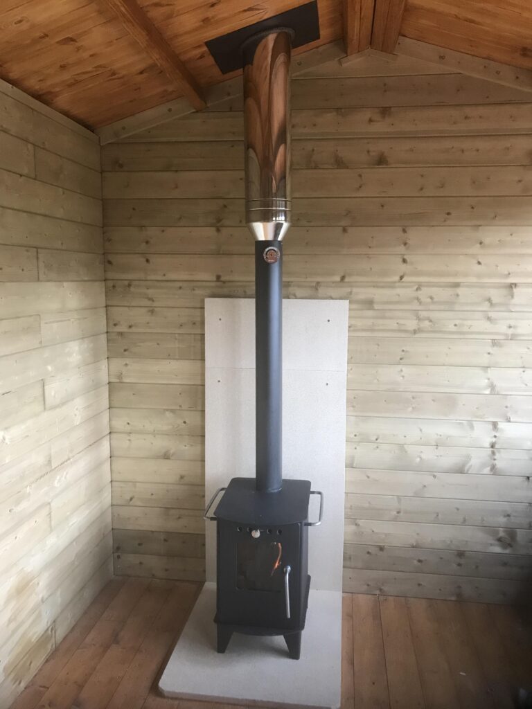 small stove installed in Garden room